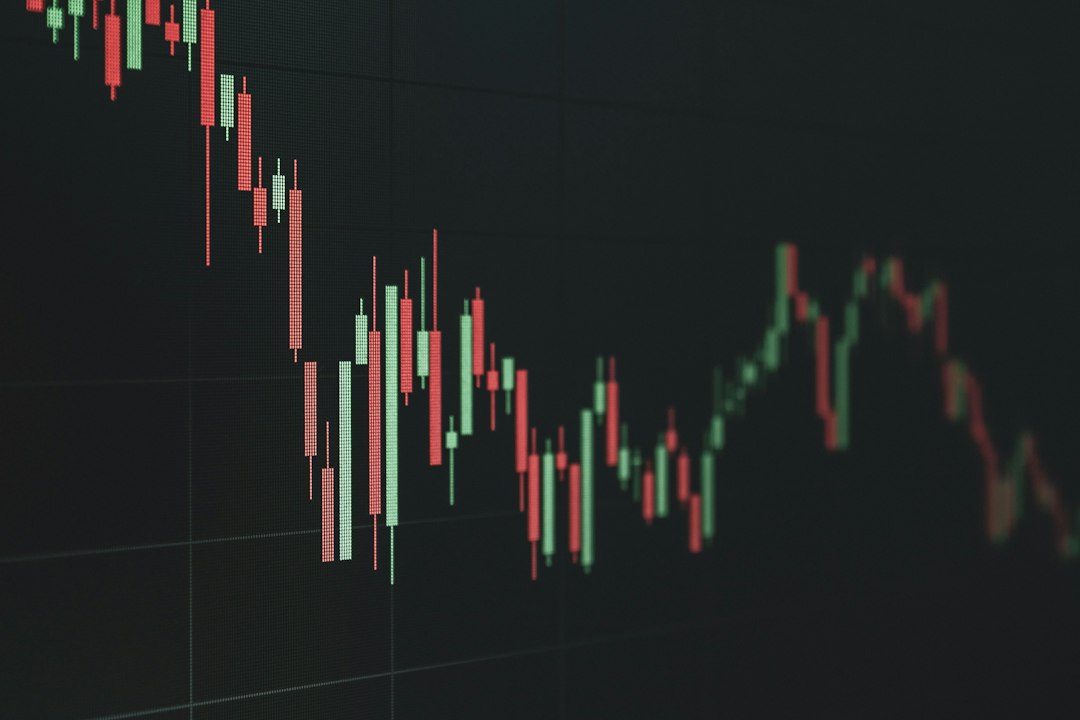 Declining stock market chart on screen, illustrating value at risk in a trading portfolio